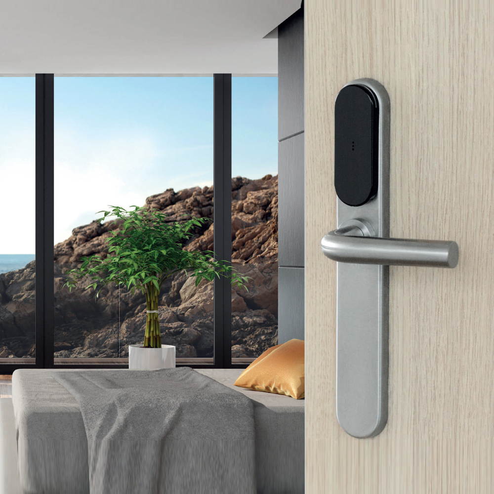 TESA i-max electronic lock on a wooden door with a mountain view